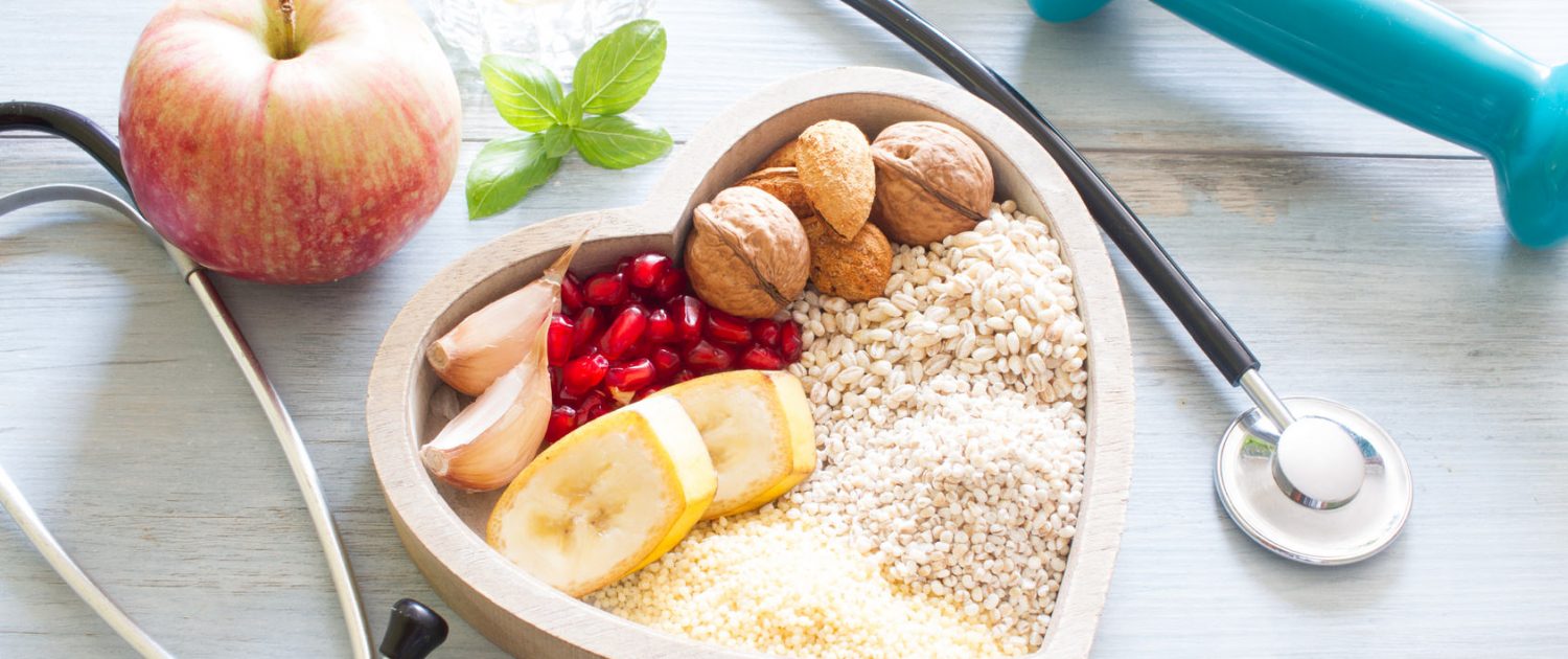 Healthy food in heart and water diet sport lifestyle concept